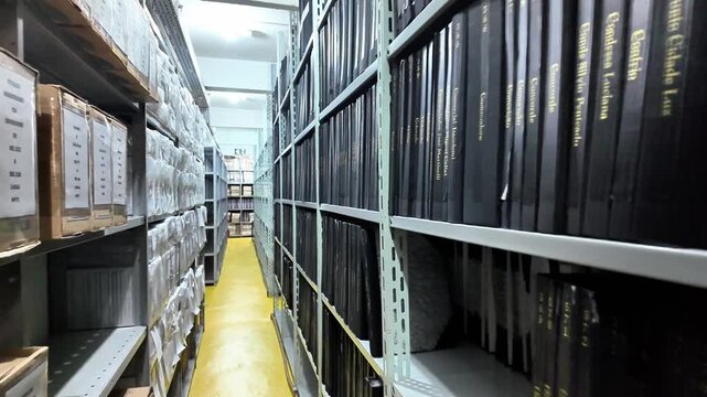 Archive Shelves with Black Binders in Registry Office Document Storage
