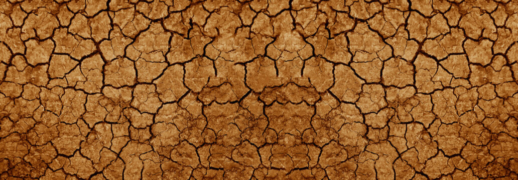 Top aerial view of texture pattern cracked brown dried land soil ground texture background. global warming idea concept Dry, Crack Earth Surface Showing Drought Conditions top view backdrop