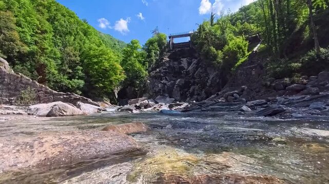 Spectacular images of the Torre River's whirlpools in Friuli. Above and below the water. The wild nature of the Julian Prealps.