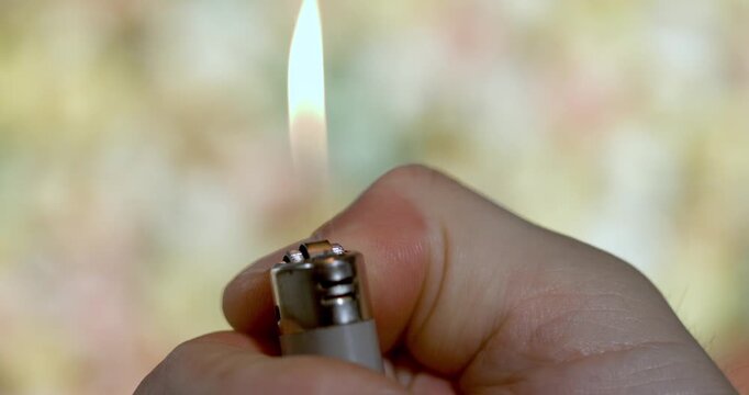 Super Slow Motion Hand Igniting Lighter In Super Slow Motion