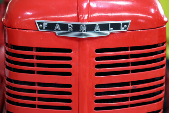 Perth, Western Australia, Australia - May 3 2026: 1944 McCormick Deering Farmall A. Close-up vintage tractor logo, emblem, symbol, brand name. Red color. Antique farming, agriculture history