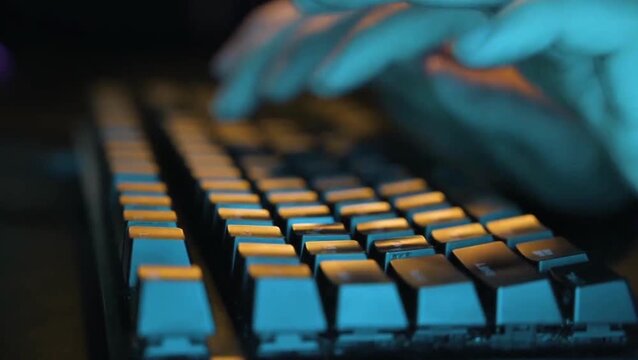 Close Up Side View Hand Typing on External Keyboard Computer