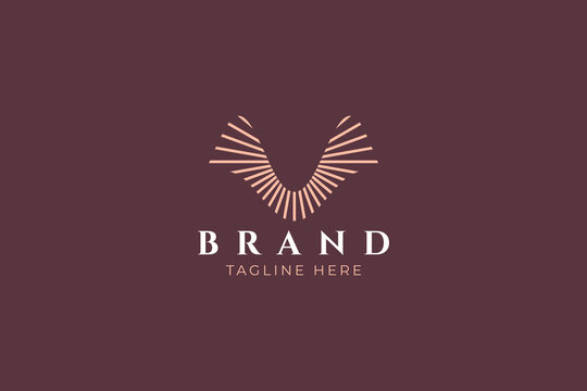 Elegant Abstract Wings and Sun Ray Luxury Logo