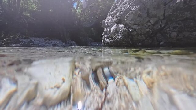 Spectacular images of the Torre River's whirlpools in Friuli. Above and below the water. The wild nature of the Julian Prealps.