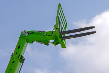 Green Telehandler Forklift Attachment Up Position Construction Machine © markobe