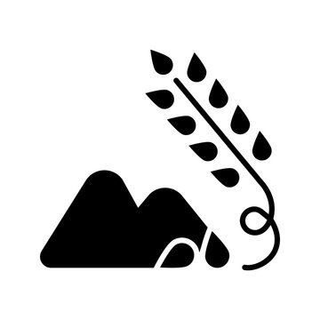 Wheat stalk icon. Agriculture and grain filled symbol. Black and white.