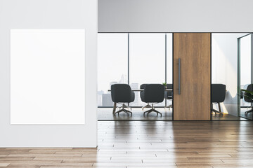 Fototapeta premium Vertical blank poster mockup on clean office wall near modern glass corridor with corporate meeting room view and wooden door in bright space. 3D Rendering