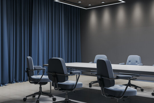 Modern empty corporate conference room interior featuring blue chairs, long meeting table, dark curtains and contemporary workspace design. 3D Rendering