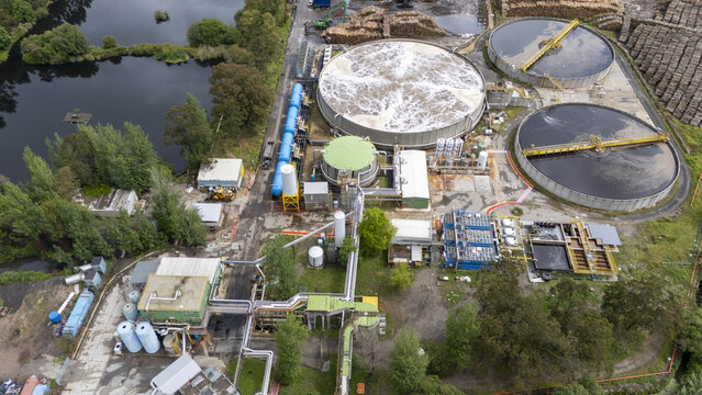 Aerial view of the Biofabrica de Ence en Pontevedra industrial facility featuring large circular settling tanks and complex piping systems Pontevedra, Pontevedra, Spain.