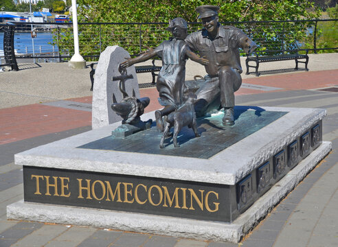 VICTORIA BC CANADA: 'The Homecoming' by Nathan Scott, which is a bronze figure sculpture commemorating the 100th Anniversary for the Canadian Navy and displayed downtown Victoria BC