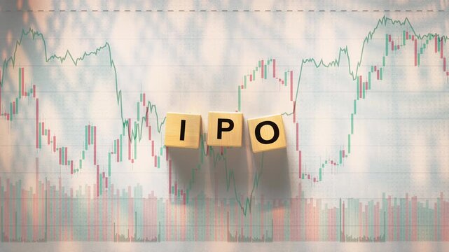 The acronym IPO Initial Public Offering is spelled out using three wooden letter blocks placed on top of a background featuring financial candlestick charts and graphs. 3D render animation