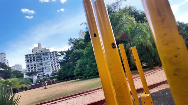 Yellow Outdoor Gym Posts at Augusta Park in Sao Paulo Urban Landscape