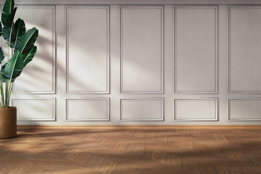 Luxury empty room with wall molding and oak parquet floor. Classical interior decor, modern architecture design, minimalist aesthetic. House renovation in vintage style.