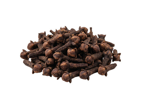 Dried whole clove buds pile isolated on black background, organic spice ingredient for cooking