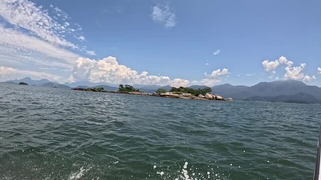 View of the sea and blue sky from inside the boat.