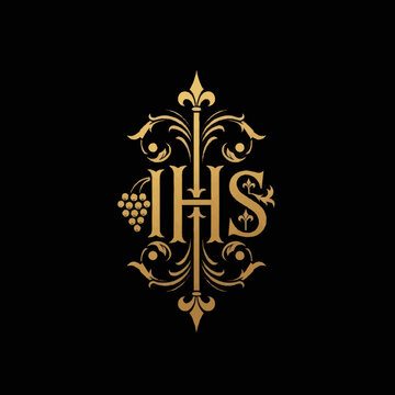 Golden IHS monogram with grapes and ornate flourishes.