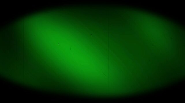 Glowing green neon light ovals on black background abstract motion visual effect