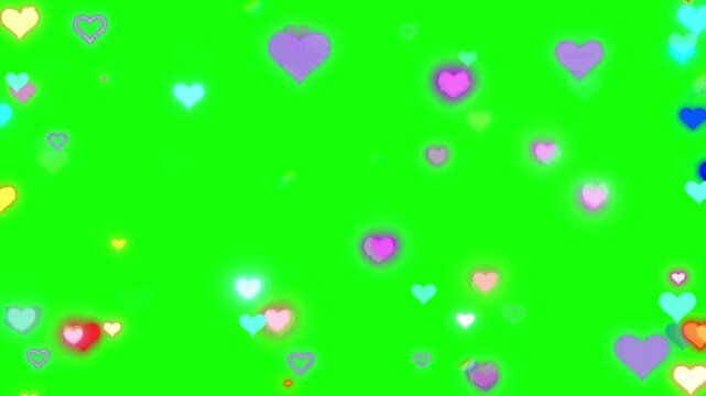 Colorful hearts floating on green background motion graphics element animated valentines day symbol love concept