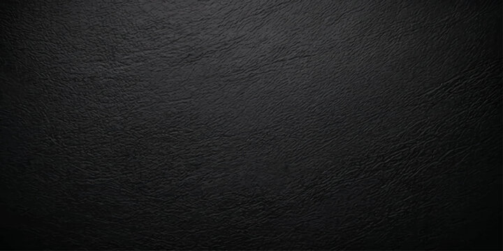 A dark grunge black and white textured background features a rough grey material pattern resembling old vintage leather and wrinkled paper surface wallpaper