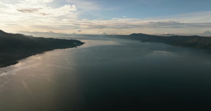 Lake Toba in the mountains of Sumatra during sunset view from above. Indonesia.