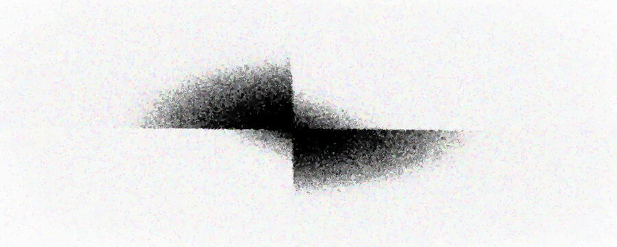 An amorphous black splotch with a spray paint effect. Features a dense, dark core that fades into a fine, grainy mist with soft, irregular edges.