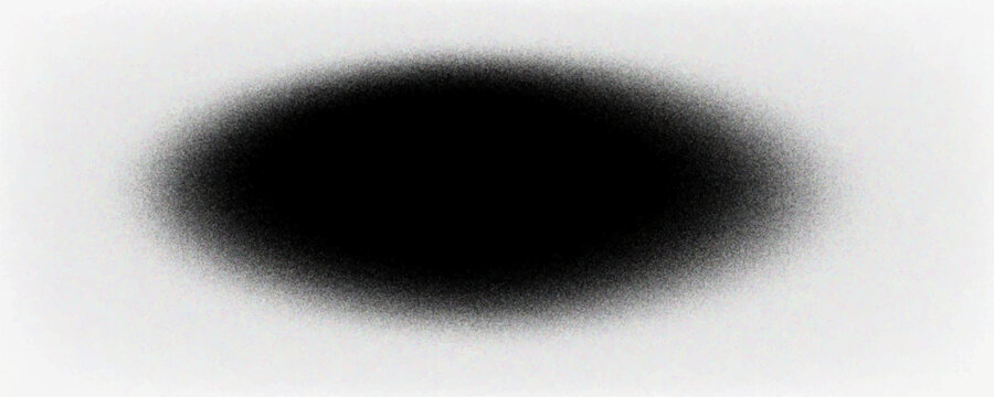 An amorphous black splotch with a spray paint effect. Features a dense, dark core that fades into a fine, grainy mist with soft, irregular edges.