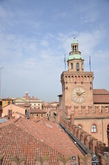 Fototapeta premium Historic Clock Tower and Medieval Palazzo in Bologna, Italy