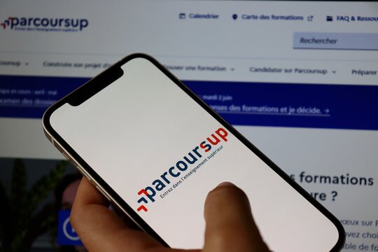 Salvador, Brazil - May 11, 2026: Parcoursup logo displayed on a smartphone screen with the official website in background. French higher education admission (Entrez dans l'enseignement sup&eacute;rieur). 