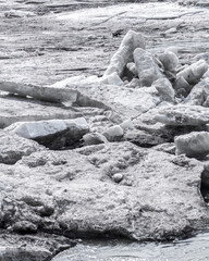 Large drifting ice blocks and melting river ice during spring ice drift on northern river, dramatic natural landscape with cold water, concept of global warming, climate change and melting glaciers © Vladimir Razgulyaev