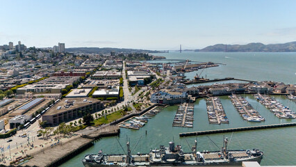 Obraz premium Drone view of San Francisco marina with boats docks waterfront and bay
