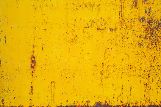 Rusty yellow metal steel plate as texture or background