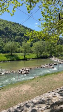 Beautiful Savinja river flowing through Celje on a sunny day