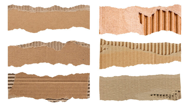 Torn corrugated cardboard paper strips with rough ripped edges isolated on black background for transparent PNG collage overlay use