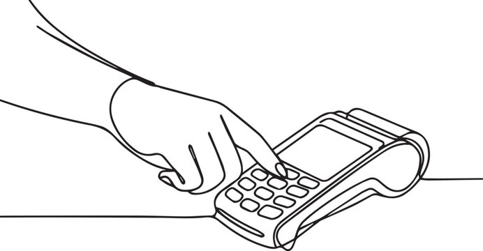 Hand using a payment terminal with a keypad to make a transaction