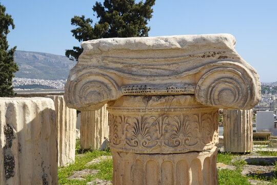 The upper part of a marble Ionic column from the monopteral, circular temple dedicated to goddess Roma and emperor Augustus, the only Roman temple ever built on the Acropolis of Athens, Greece