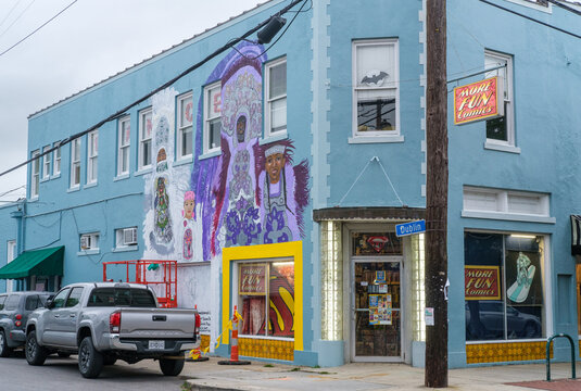 New Orleans, LA, USA - April 30, 2026: More Fun Comics Store, with Dance Studio Upstairs, on Oak Street in the Carrollton Neighborhood 