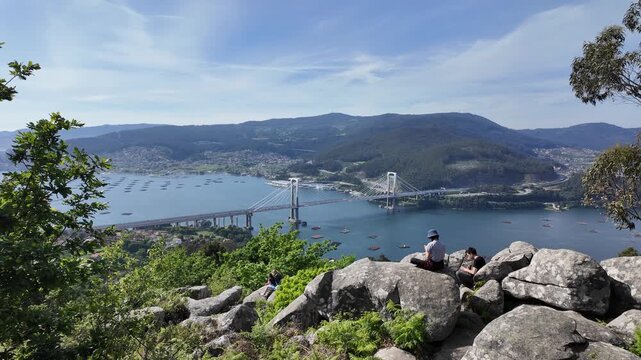 Rande bridge crossing ria de vigo with mussel farms from a viewpoint