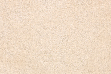 Obraz premium Beige plaster wall texture background with subtle rough surface