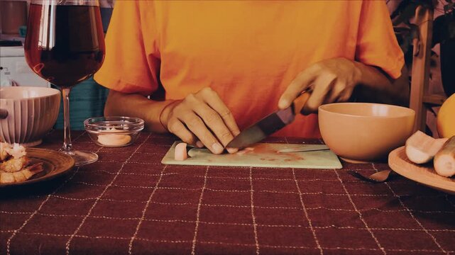 a student is preparing dinner.