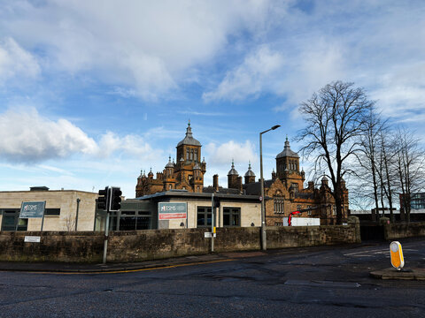 Historic sandstone Stewart's Melville College building and street scene in Edinburgh Scotland UK with dramatic sky and Victorian architecture