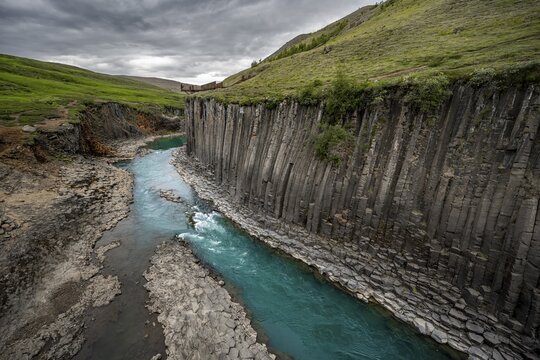 Stu&eth;lagil Canyon, turquoise river between basalt columns, Egilsstadir, Iceland