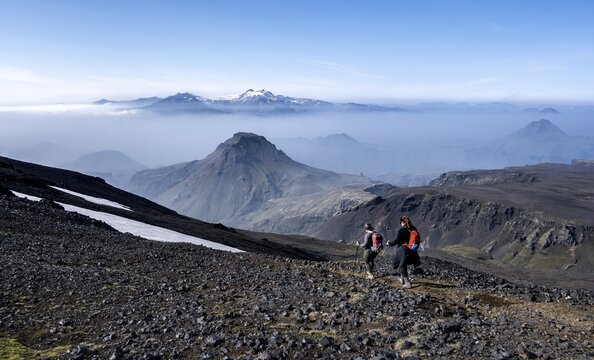 Two hikers on hiking trail through volcanic landscape, view of mountain landscape, hiking trail Fimmv&ouml;r&eth;uh&aacute;ls, &THORN;&oacute;rsm&ouml;rk Nature Reserve, Su&eth;urland, Iceland