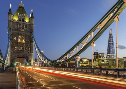 Tower Bridge in the evening, light tracks of passing cars, London, England, Great Britain