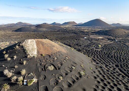 Typical drywall viticulture in volcanic landscape, on volcanic ash, lapilli, aerial view, vines, La Geria wine-growing region, Lanzarote, Canary Islands, Spain