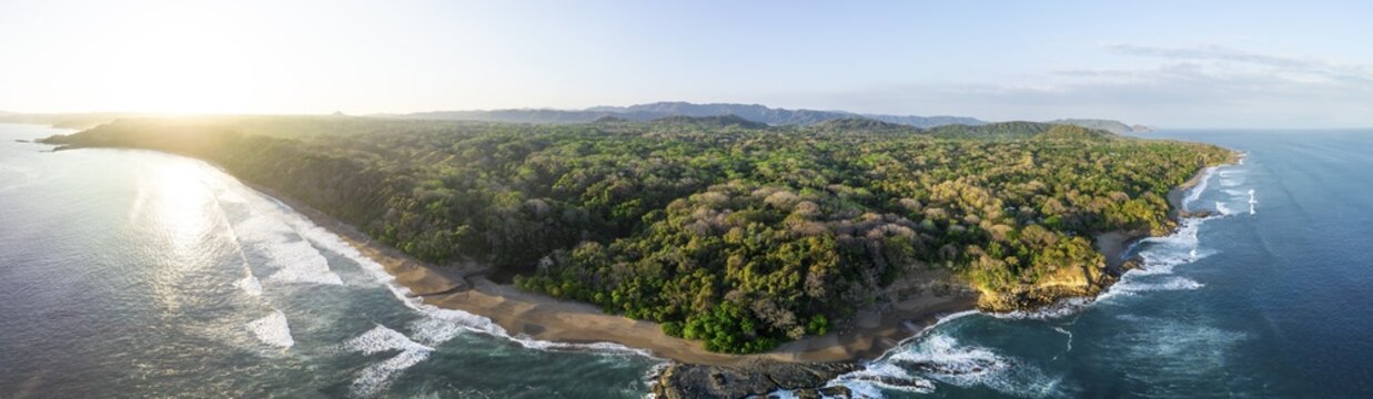 Aerial view, rainforest, sandy beach and coast with waves, Playa Cocalito, Puntarenas, Costa Rica