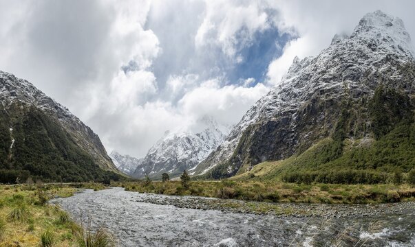 Valley with snow-capped mountains, Hollyford River, Fiordland National Park, Te Anau, Southland, South Island, New Zealand