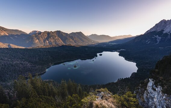 Eibsee lake and Zugspitze massif with Zugspitze, sunrise, Wetterstein range, near Grainau, Upper Bavaria, Bavaria, Germany