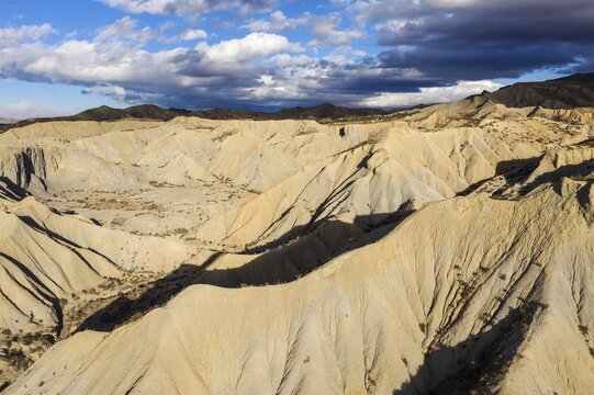 Bare ridges of eroded sandstone in the Tabernas Desert, aerial view, drone shot, Almeria province, Andalusia, Spain