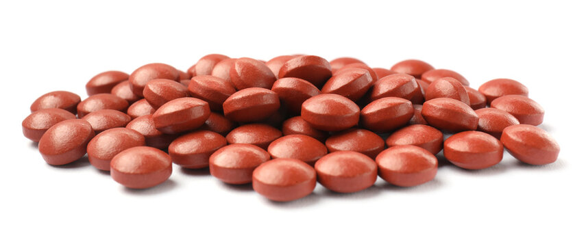 Pile of many pills isolated on white