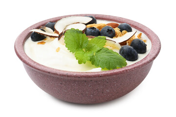 Obraz premium Tasty yogurt with coconut, blueberries, nuts, oatmeal and melissa isolated on white